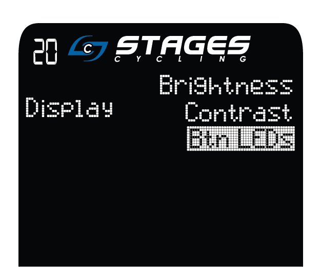 On peut lire « Display » à gauche de l’écran de la console et les menus « Brightness, Contrast et Btn LEDs » à droite, avec « Btn LEDs » mis en évidence.